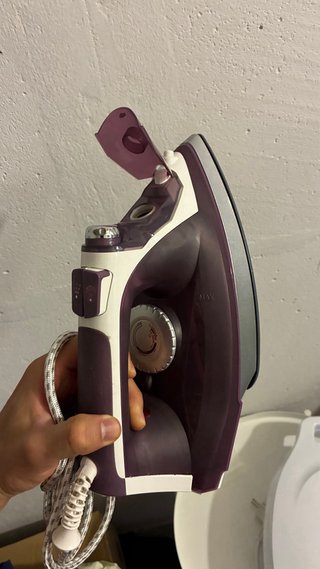 Plancha de ropa morada