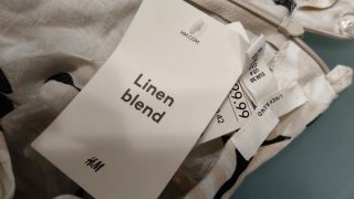 Falda midi H&M nudo lateral estampado