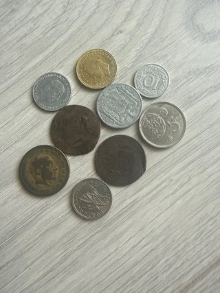 12 monedas de colección antiguas de distinto país!