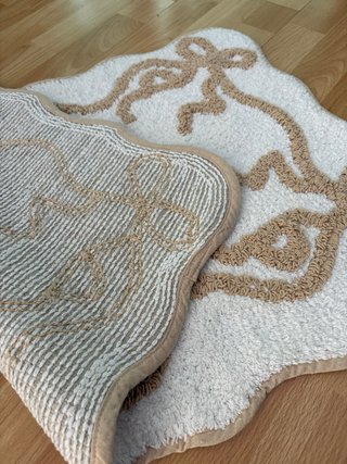 Tappeto bagno con fiocchi