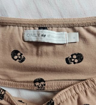 Top sin tirantes calaveras nude