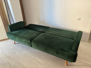 Sofá-cama terciopelo verde Maison de Monde.