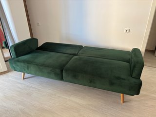 Sofá-cama terciopelo verde Maison de Monde.