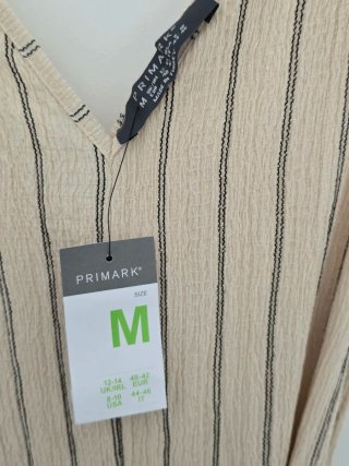 Mono de verano beige