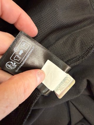 Chaqueta The North Face gris y negra