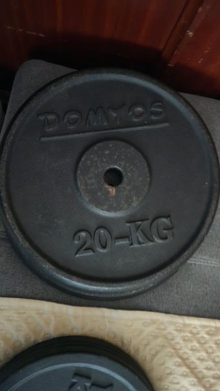 Banco musculación + barras y discos