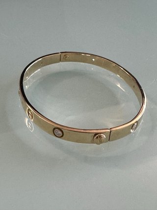 Brazalete Fabricado modelo Cartier oro18k brillant