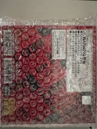 Caja NIKKE Metallic Pass Collection Vol. 2