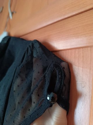 Camisa negra. C&A