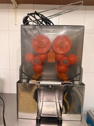 Exprimidora automática de naranjas profesional