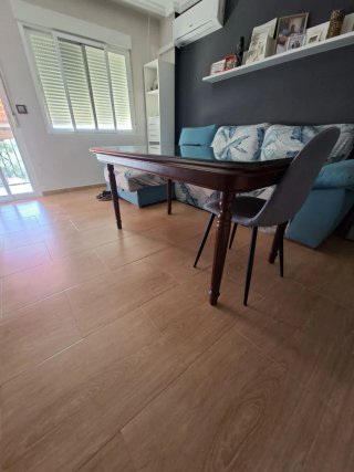 Mesa de salón extensible madera.