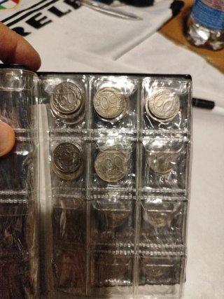 Raccoglitore per monete World Coin Stock