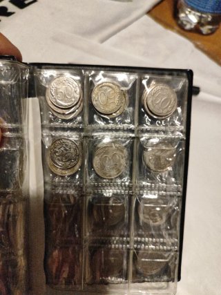 Raccoglitore per monete World Coin Stock