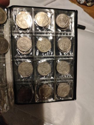 Raccoglitore per monete World Coin Stock