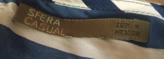 Blusa de rayas con cremallera