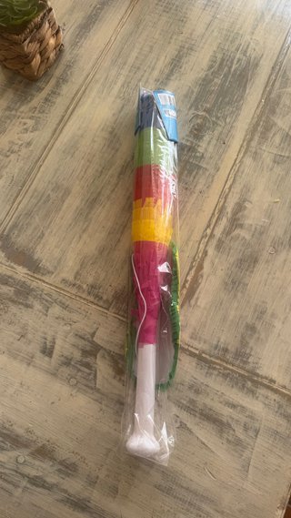 Palo y máscara para piñata multicolor