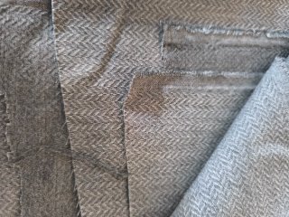 Tela gris con textura y caída