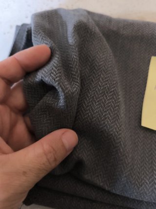 Tela gris con textura y caída