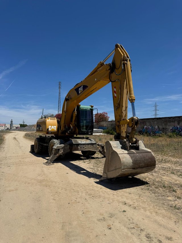 Excavadora Caterpillar 322C Ruedas