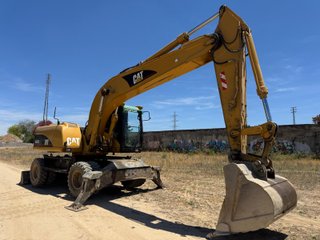 Excavadora Caterpillar 322C Ruedas