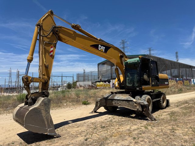 Excavadora Caterpillar 322C Ruedas