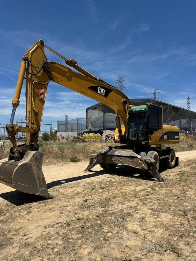 Excavadora Caterpillar 322C Ruedas