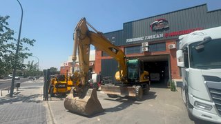 Excavadora Caterpillar 322C Ruedas