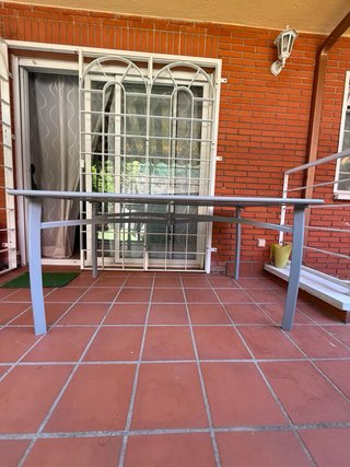 MESA DE JARDÍN EN CRISTAL Y METAL