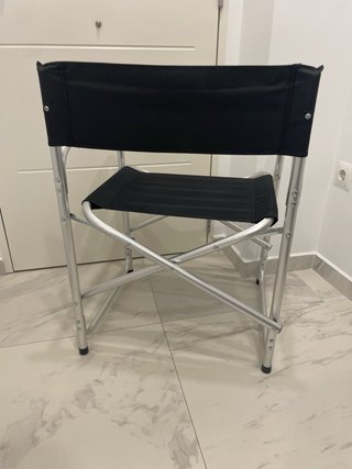 Silla para la playa negra metálica casi nueva