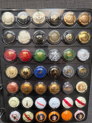 Colección muy exclusiva de chapas champagne