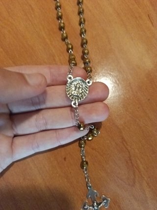 Rosario bañado en Oro