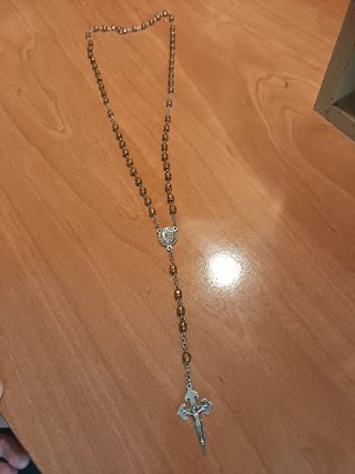 Rosario bañado en Oro