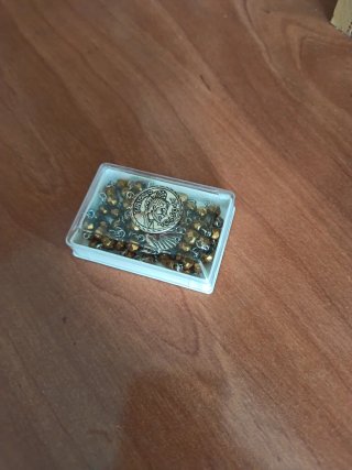 Rosario bañado en Oro