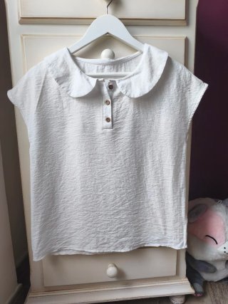 Blusa blanca con cuello Peter Pan
