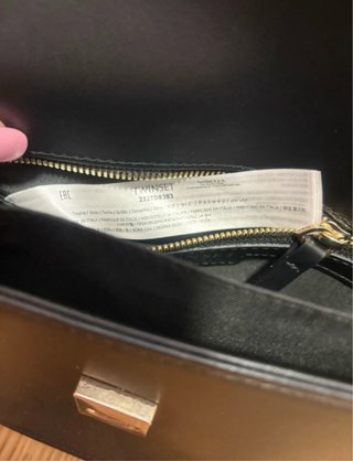 Borsa Twinset nera con dettagli oro