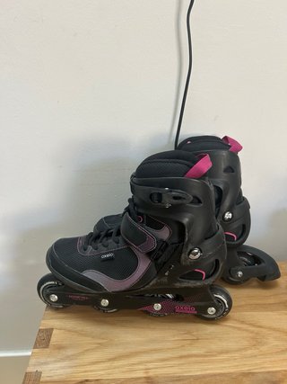 Patines en línea Oxelo negros y rosas.