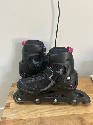 Patines en línea Oxelo negros y rosas.