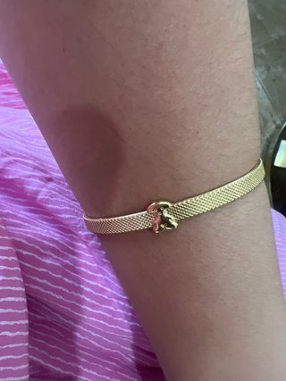 Pulsera dorada con oso