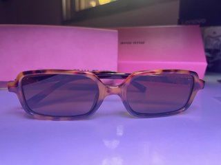 Gafas Miu Miu Tortoise y Dorado