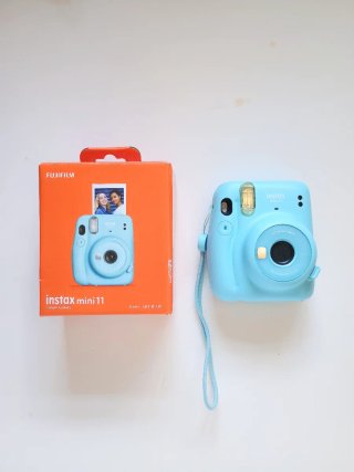 Cámarade fotos polaroid Instax Mini 11