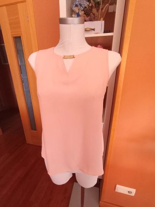 Blusa rosa vaporosa talla P