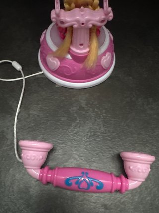 Telefono giocattolo rosa con musica
