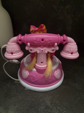 Telefono giocattolo rosa con musica