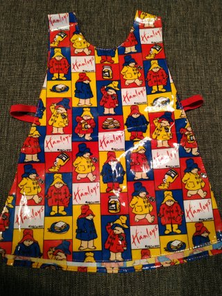 Delantal infantil plastificado y bolso Paddington