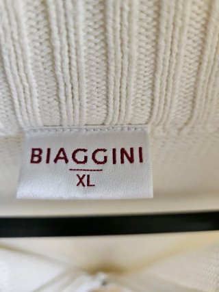 Chaqueta unisex de punto blanca con cremallera