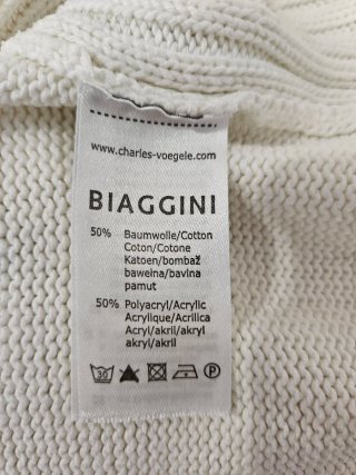 Chaqueta unisex de punto blanca con cremallera