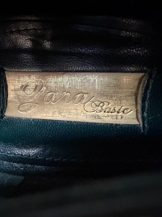 Botines de tacón verde oscuro con cordones negros
