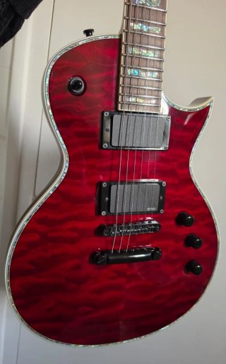 Guitarra ESP LTDEC-1000QM STBC Roja