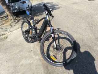 Bicicleta eléctrica doble suspensión marca Moma