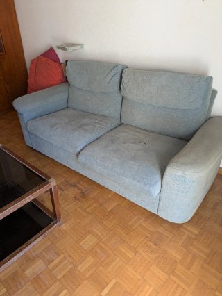 Sofá cama gris de tela